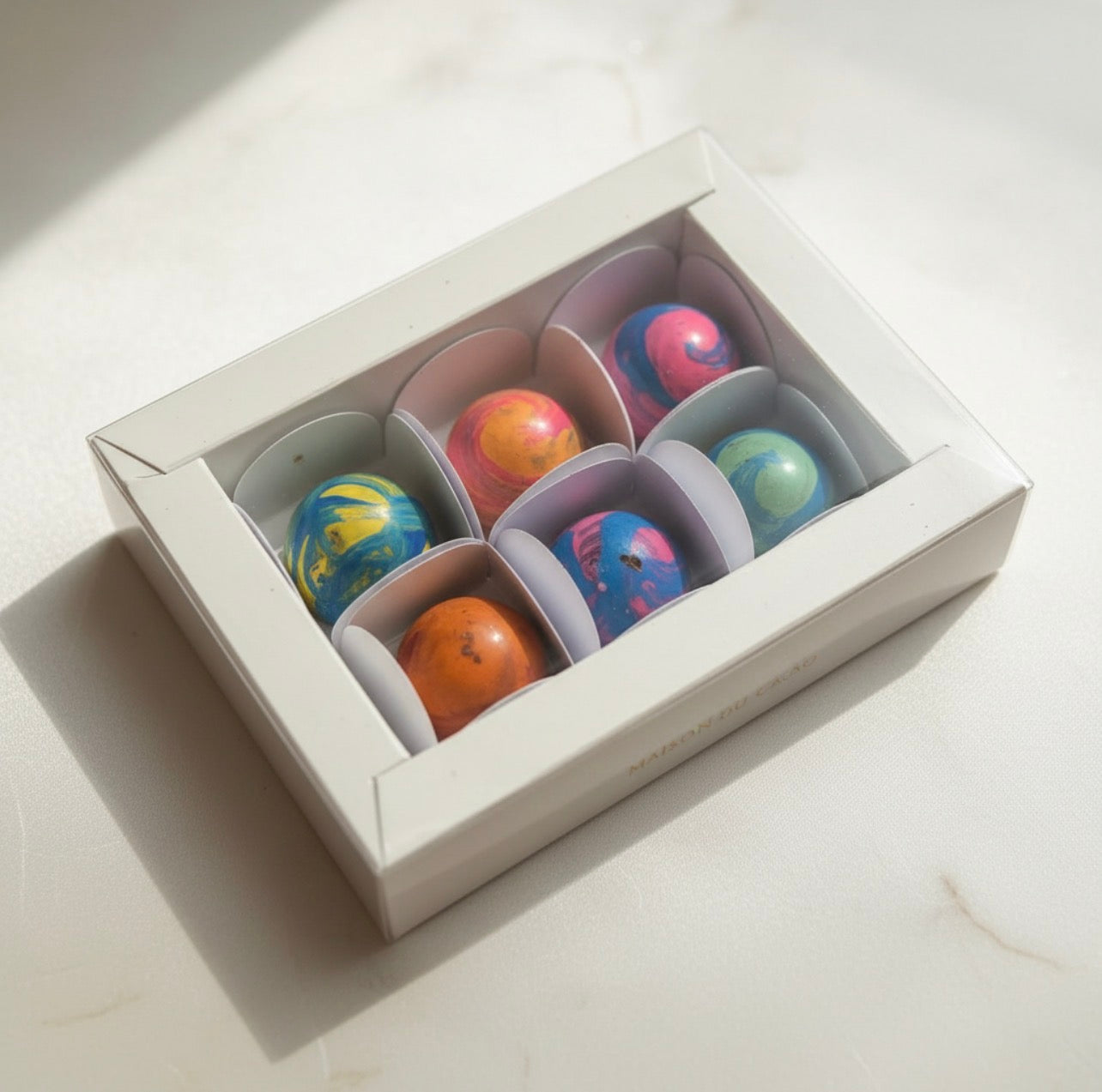 Caixa de papel cartão com 6 bombons